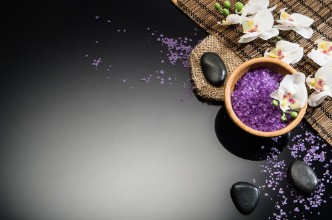 Afbeeldingen van Spa concept background on black reflective background Top view frame product photograph with copy space Concept photograph with room for text or advertising