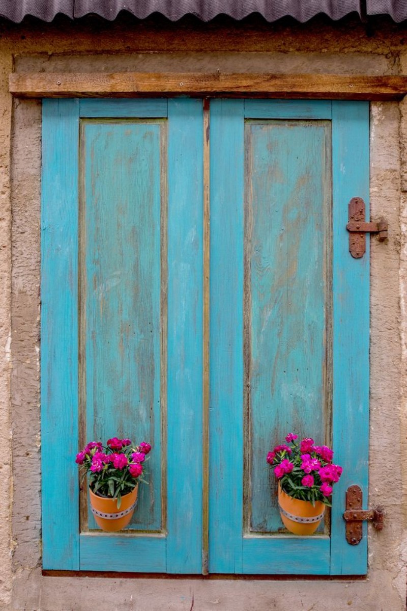 Afbeeldingen van Alte Fensterladen mit Blumen