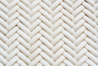 Picture of Close up synthetic white rattan weaving the seat of a chair
