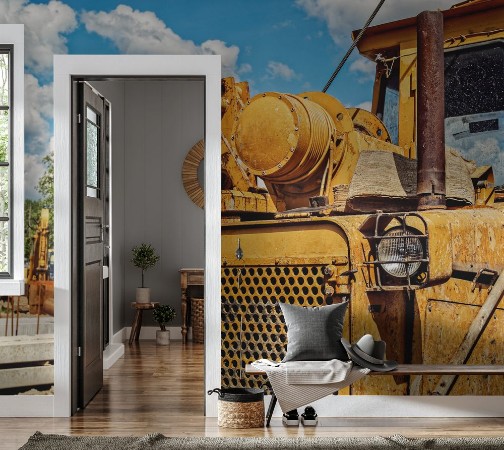 Picture of Old dirty yellow tractor or bulldozer is on the industrial site