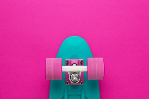 Εικόνα της Plastic mini cruiser board on deep pink with background with copy space