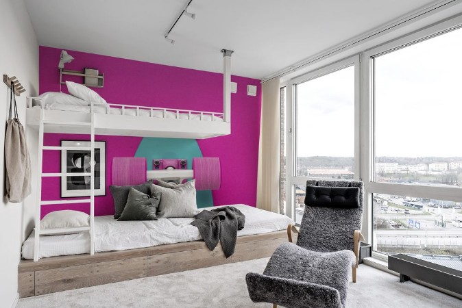 Picture of Plastic mini cruiser board on deep pink with background with copy space