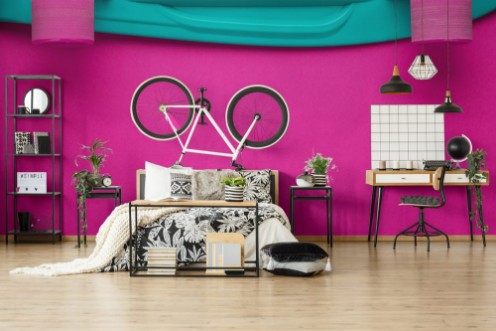 Picture of Plastic mini cruiser board on deep pink with background with copy space