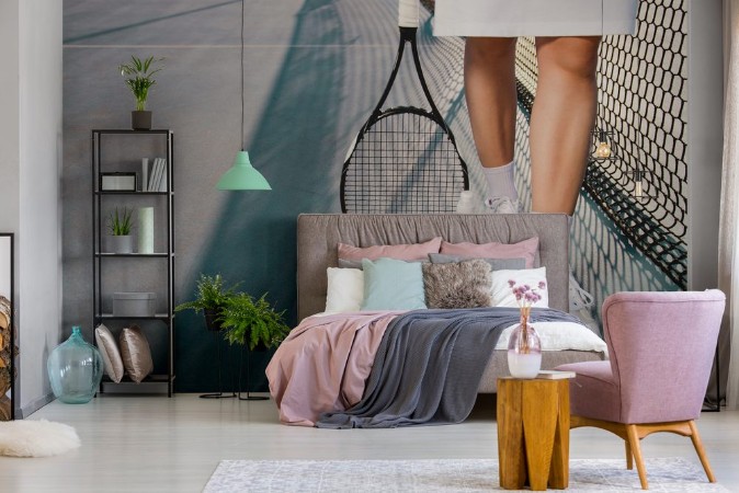 Picture of Tennis concept  woman legs next to tennis balls and refreshing drink next to net  copy space  outdoors 