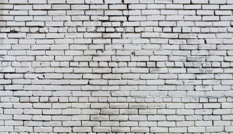 Image de Brick wall painted with white paint