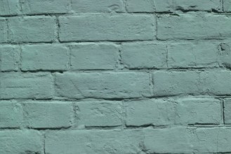 Image de Brick wall covered with green lime