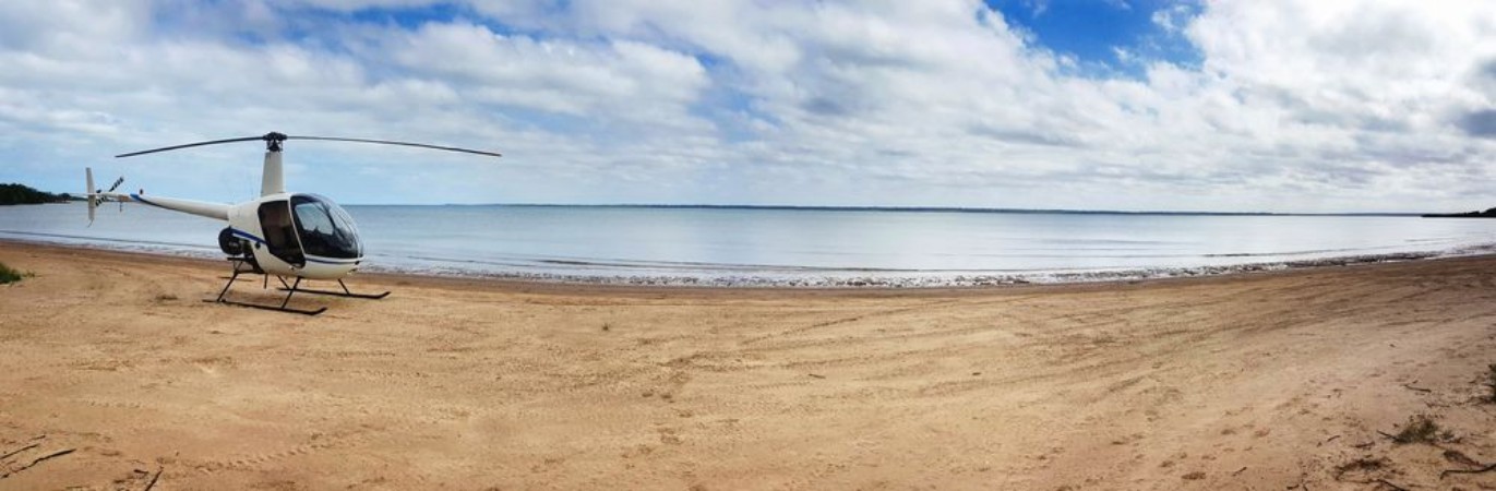 Afbeeldingen van Helicopter on the beach panorama