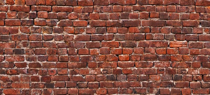 Afbeeldingen van Vintage masonry red brick wall background for design