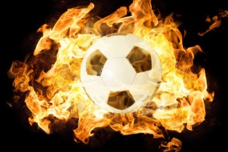 Picture of Brennender Fuball vor schwarzem Hintergrund