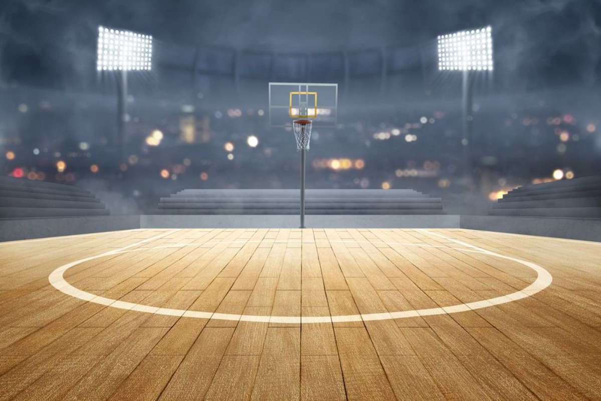Picture of Basketball court with wooden floor lights reflectors and tribune
