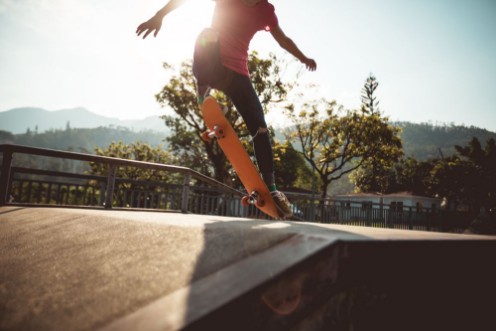 Picture of Skateboarder skateboarding on skate park