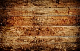 Pilt Scratched wooden background