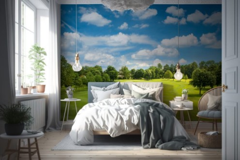 Image de Green golf field and blue cloudy sky