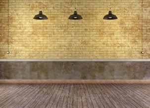 Bild von Empty grunge room with brick wall