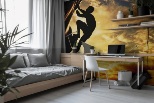 Picture of A silhouette of man climbing on mountain at sunset Adrenaline