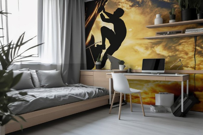 Afbeeldingen van A silhouette of man climbing on mountain at sunset Adrenaline