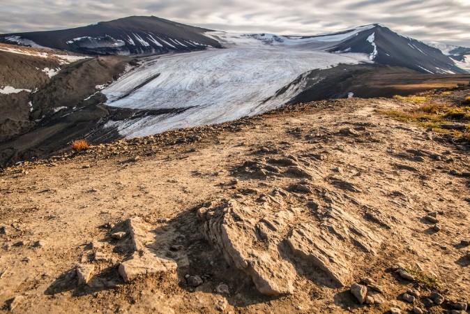 Picture of View from the mountain top to the snow-capped peaks