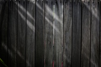 Pilt Black wood plank background