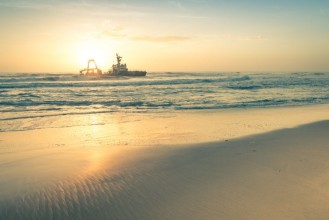 Picture of Shipwreck at sunset on the namibian Skeleton Coast - Namibia