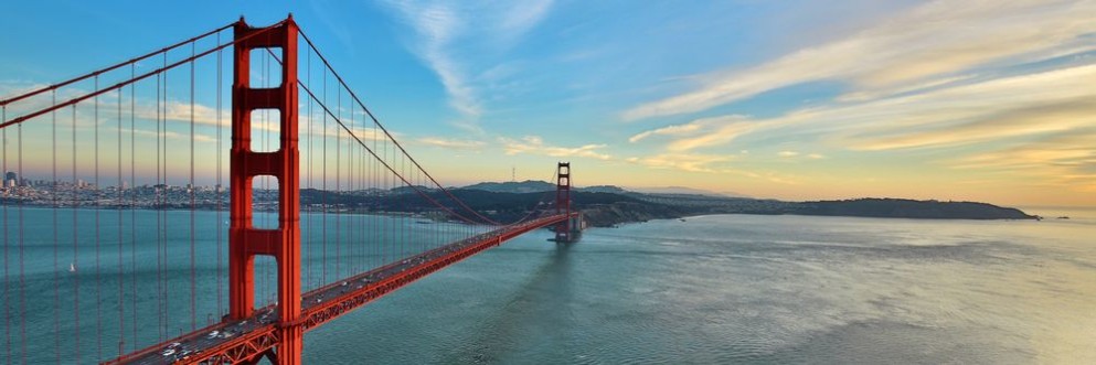 Golden Gate Bridge panorama San Francisco California sunset light on cloudy sky  photowallpaper Scandiwall
