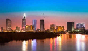 Picture of Saigon skyline with river after sunset Vietnam