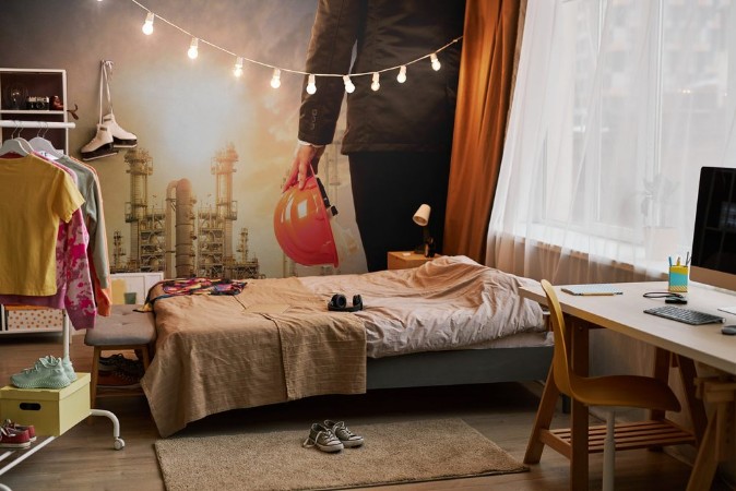 Picture of Engineering man with safety helmet standing in industry estate a