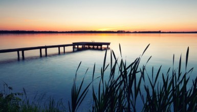 Bild von Bootssteg am See
