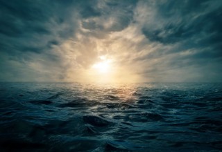 Bild von Sunset on stormy sea