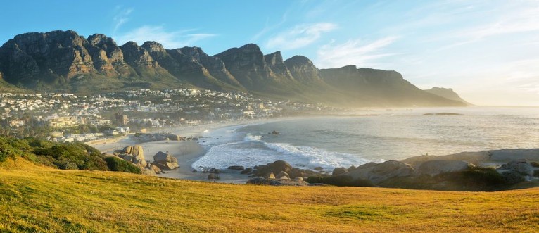 Picture of Camps Bay Beach in Cape Town South Africa with the Twelve Apostles in the background