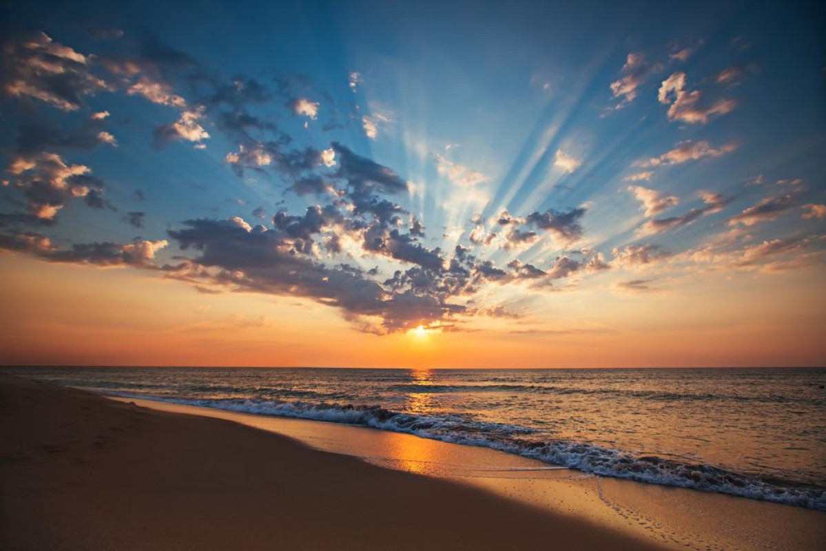 Picture of Beautiful cloudscape over the sea sunrise shot