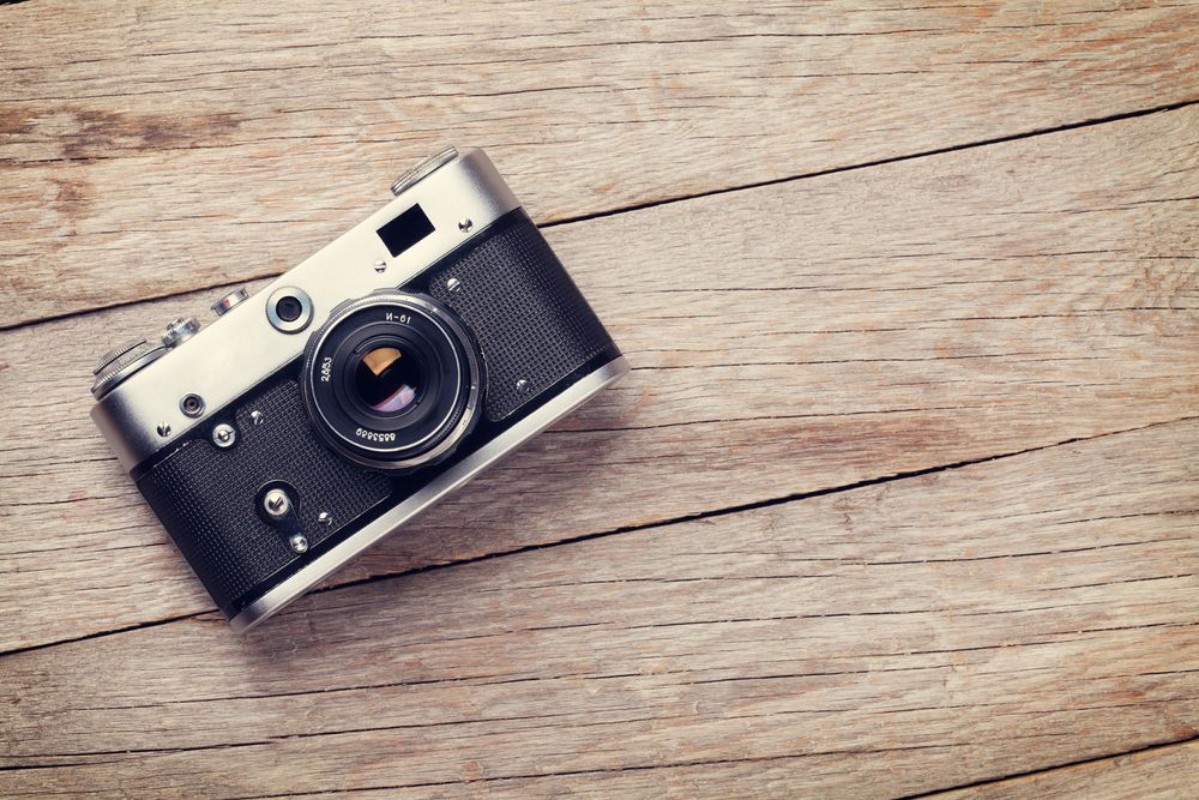Picture of Vintage camera on wooden table
