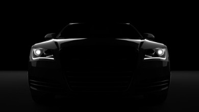 Afbeeldingen van Computer generated image of a sports car studio setup on a dark background
