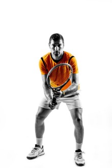 Bild på Man tennis player on white background 