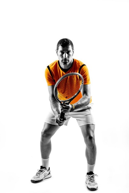 Afbeeldingen van Man tennis player on white background 