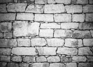 Bild von Old white stone wall detailed background