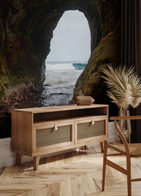 Afbeeldingen van Natural tunnel in the rock dug by sea waves