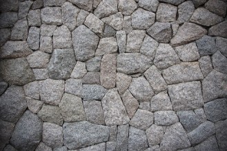 Bild von Old stone wall texture for background