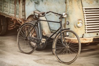 Picture of Retro styled image of an ancient bike and truck