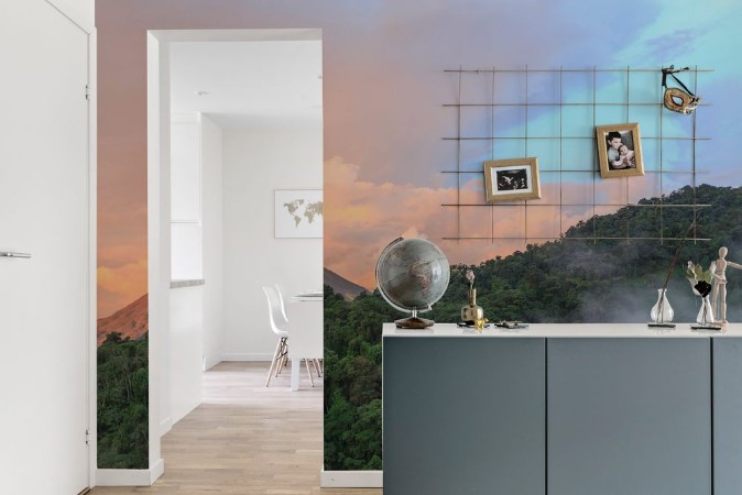 Picture of Sunset by Arenal Volcano in Costa Rica cloud forest clouds rise from the jungle floor