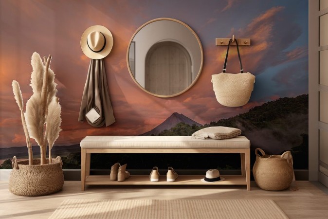 Picture of Sunset on Lake Arenal and Arenal Volcano in Costa Rica brings Shades of red and orange as clouds rise from the jungle floor