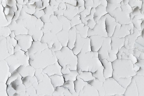 Снимка на Cracked flaking white paint background texture