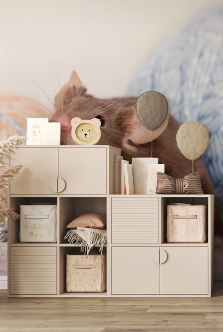 Afbeeldingen van Funny domestic mouse is hiding among tangles of yarn Yarn is blue beige pink and fluffy Mouse has bushy wiskers Mouse is funny cute and curios