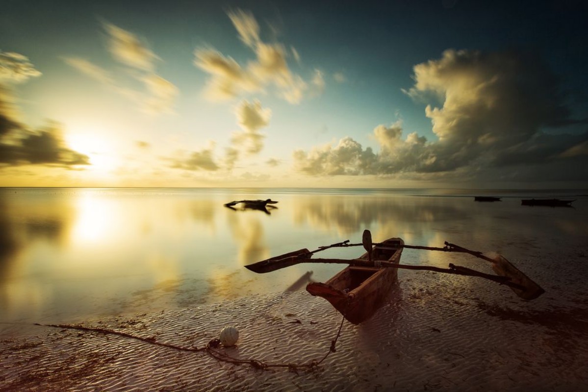Picture of Traditional fisher boat in Zanzibar on a white beach at a beauti