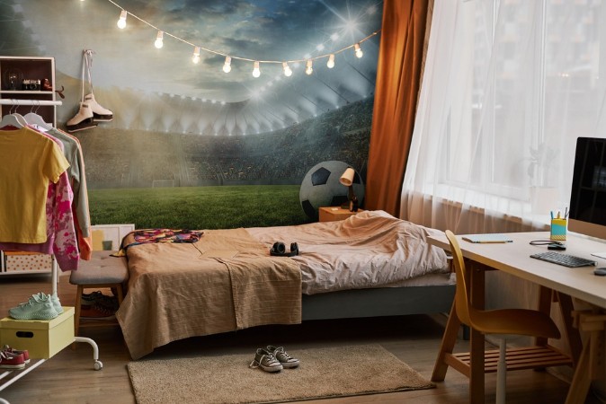 Ball on grass in football Stadium photowallpaper Scandiwall